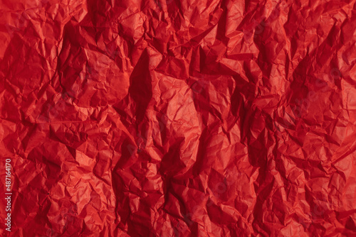 Bright red paper texture or background.