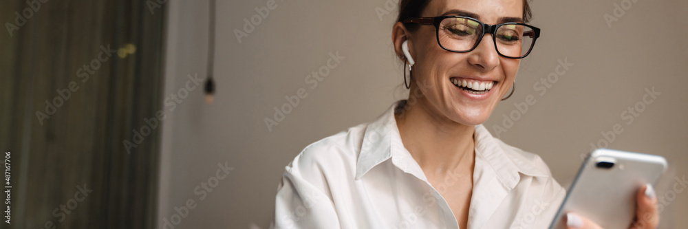 Smiling mid aged brunette white businesswoman Smiling mid aged brunette white businesswoman