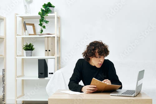 guy laptop sitting on white sofa online training Lifestyle technology