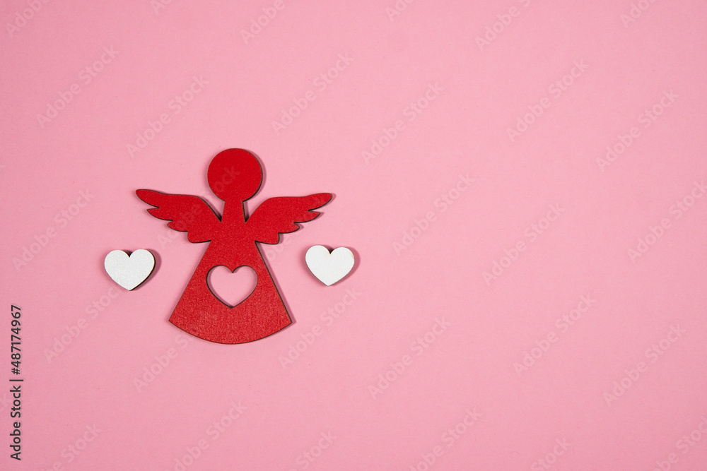 Fototapeta premium angel with two hearts on a pink background