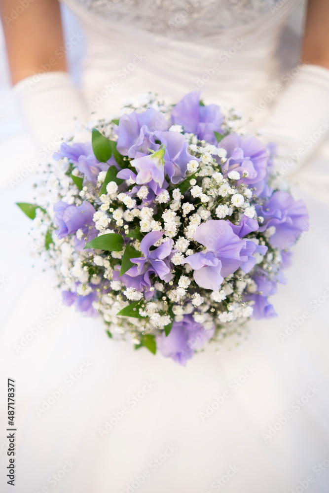 A bouquet of refreshing shades with a woman in a white dress A bouquet of refreshing shades with a woman in a white dress