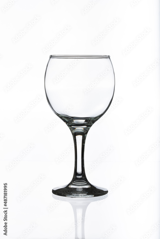 Empty glass wine glass on a white background