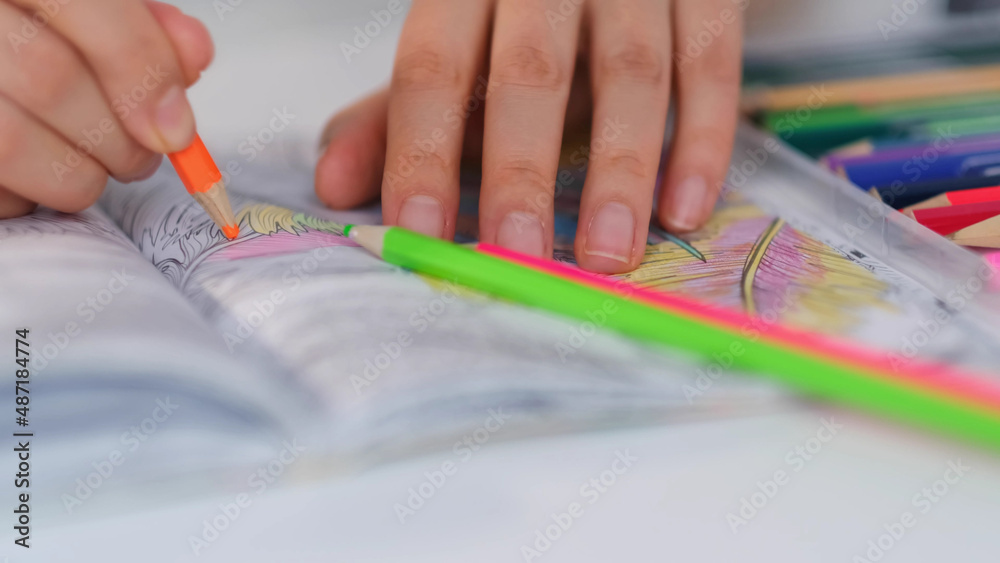 Little boy massaging with ball his foot. Feet Massage Using Trigger