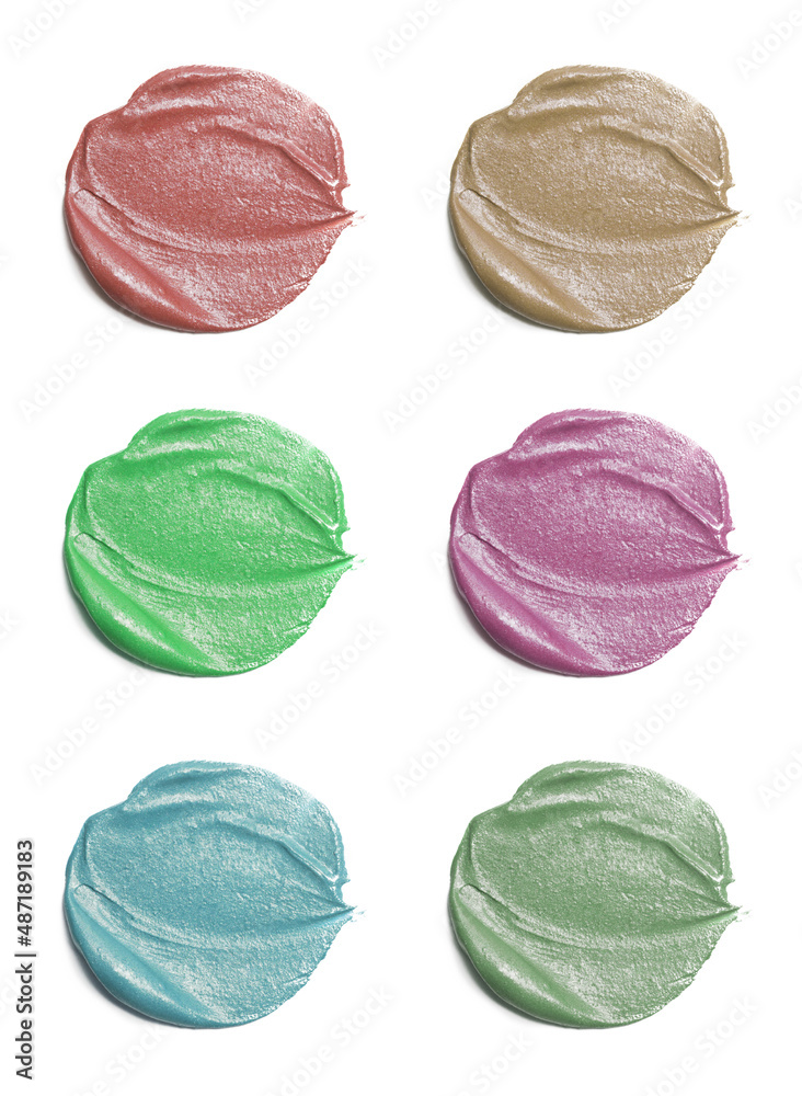 Natural cosmetic face mud samples isolated on white. Set of skin clay smears close up. Natural cosmetic face mud samples isolated on white. Set of skin clay smears close up.