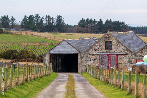 PORTGORDON,MORAY,SCOTLAND - 13 FEBRUARY 2022: This is the road leading to a Farmhouse and its outbuildings in Portgordon, Moray, Scotland on 13 February 2022