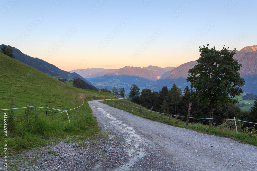 Fototapeta premium Panorama view with alpine mountains and blue sky in Salzburgerland, Austria