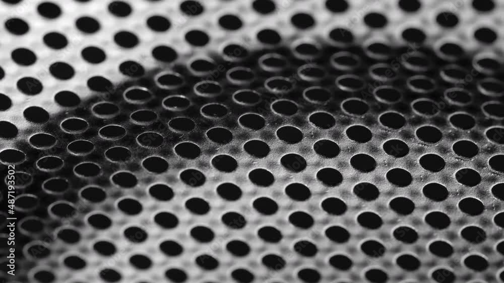 Grid motion background. Rotated perforated steel surface background. Grid motion background. Rotated perforated steel surface background.