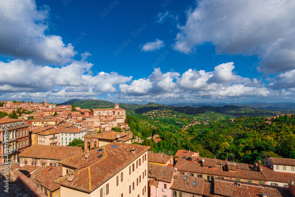 View of Perugia medieval historic center and Umbria countryside from city panoramic terrace