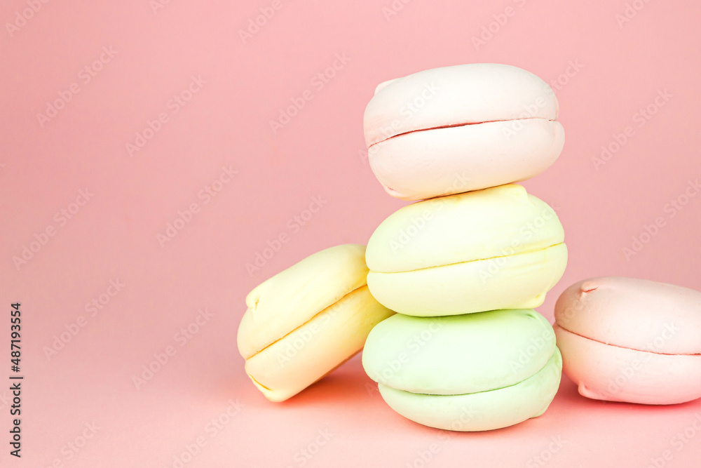 Sweet and colourful french marshmallows looks like macaroons. Delicious background.