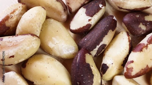 Closeup of Brazil nuts rotating.