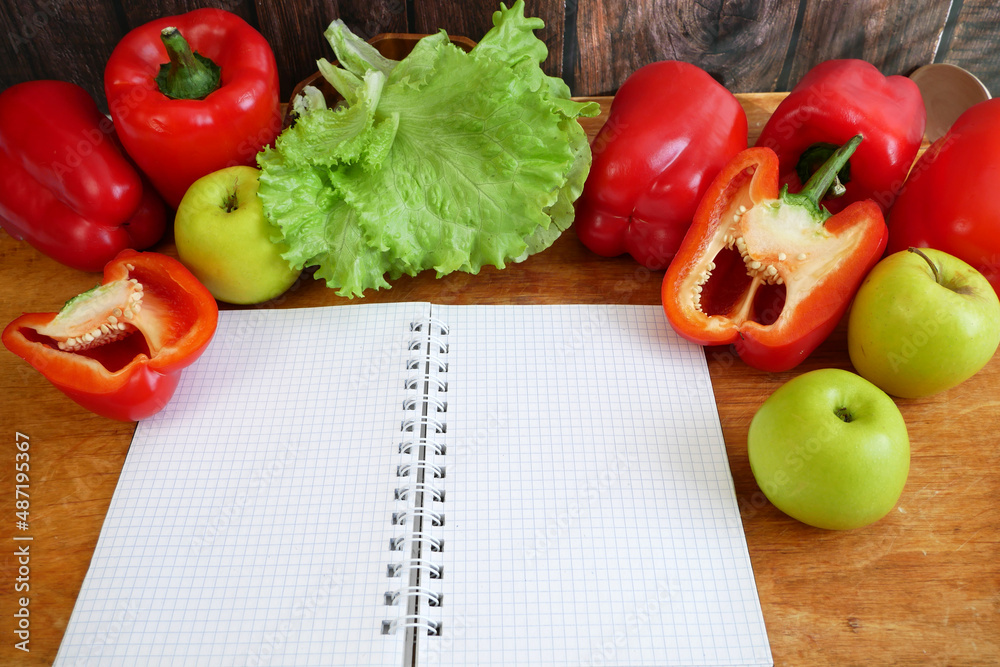 notebook for a diet plan with fresh vegetables and fruits on table, keto diet concept notebook for a diet plan with fresh vegetables and fruits on table, keto diet concept