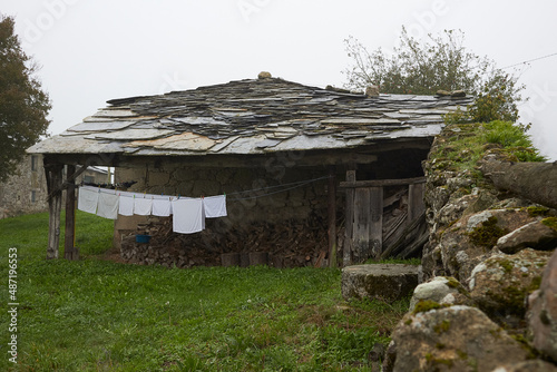 Village house with clothes on the line
