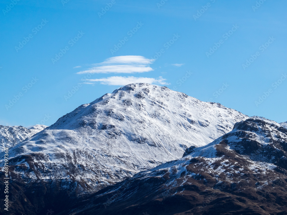 Snow covered mountain peak near Loch Duich