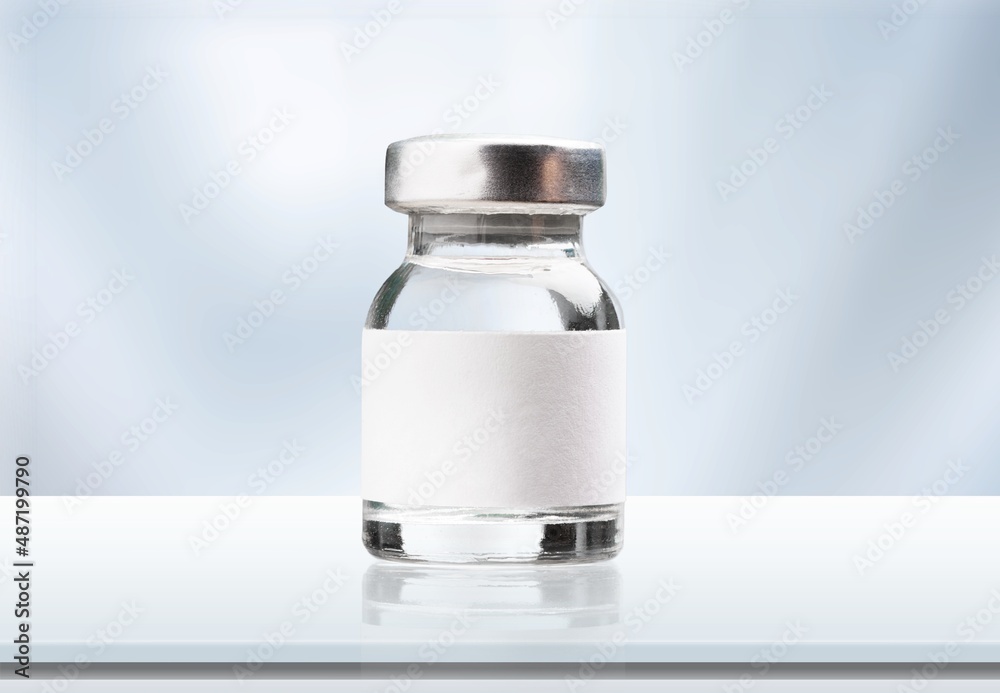 A new covid-19 vaccine ampoule or vial. Concept new vaccine for coronavirus A new covid-19 vaccine ampoule or vial. Concept new vaccine for coronavirus