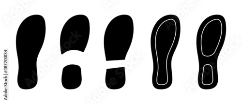 Shoe prints. Human footprints. Vector black silhouettes of boot prints. Black icons on white background.
