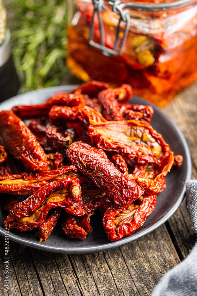 Sun dried tomatoes on plate.