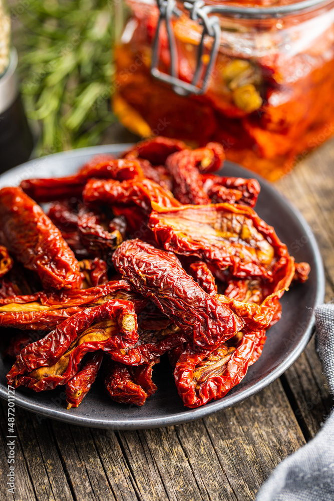 Sun dried tomatoes on plate. Sun dried tomatoes on plate.