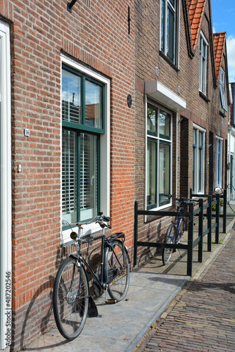 Typical Dutch street - bicycles are on a house facade