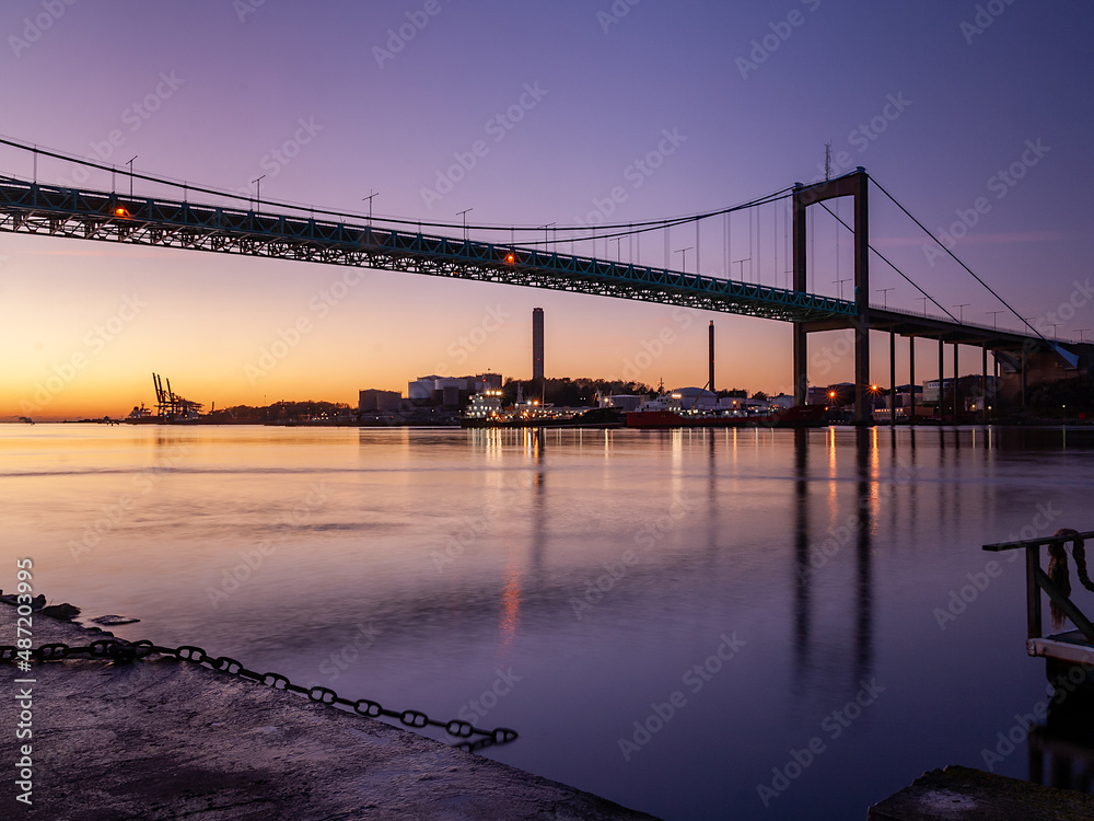 Gothenburg, Göteborg, Sweden, Sverige, 2011 - Panoramic view of Älvsborg bridge during colorful sunset.