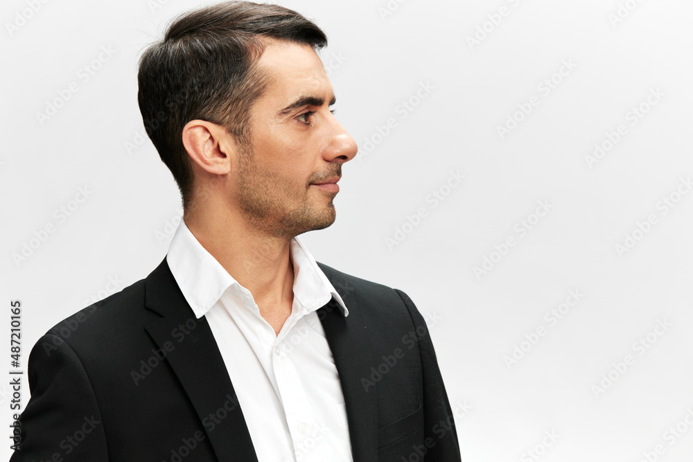 handsome man black suit side view hand gestures emotions isolated background handsome man black suit side view hand gestures emotions isolated background