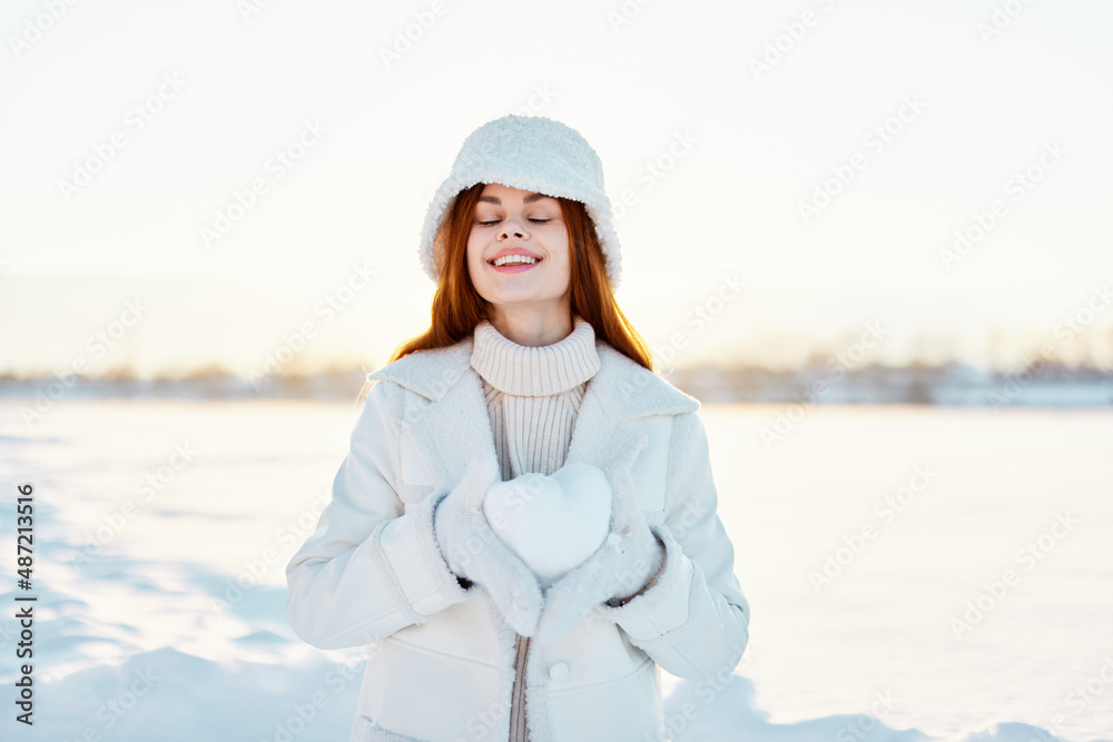 beautiful woman smile Winter mood walk white coat snow in the hands travel beautiful woman smile Winter mood walk white coat snow in the hands travel