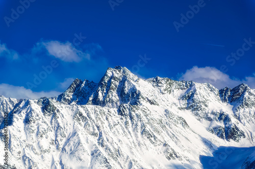 Austrian Alps mountain peaks covered with snow during winter time.