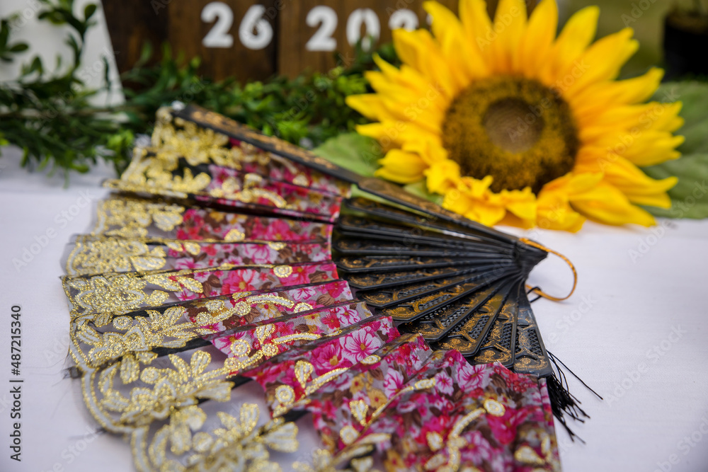 Ornamental fan with sunflower wedding decoration