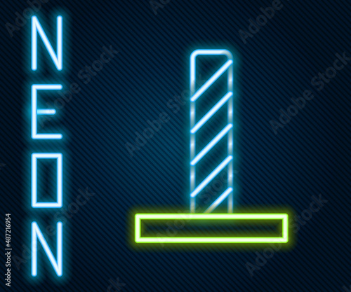 Glowing neon line Cat scratching post with toy icon isolated on black background. Colorful outline concept. Vector