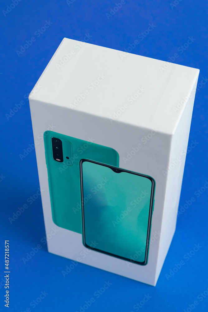 White cell phone box on the background White cell phone box on the background
