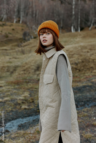 woman in the autumn forest walk fresh air travel landscape