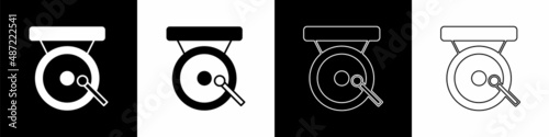 Set Boxing gong icon isolated on black and white background. Boxing bell. Vector