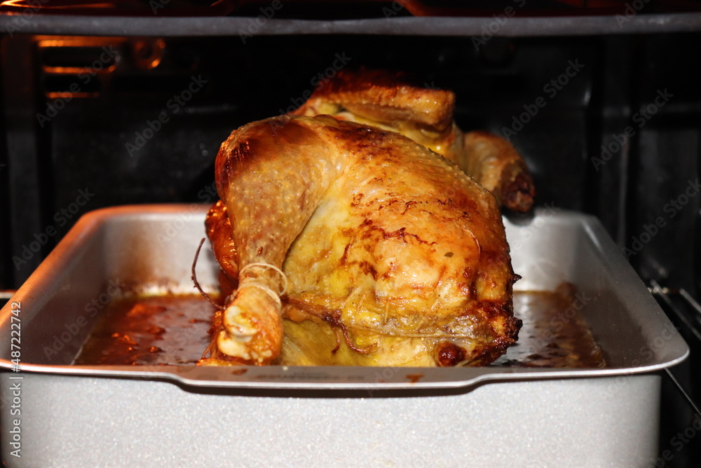 Fototapeta premium Capon in the oven