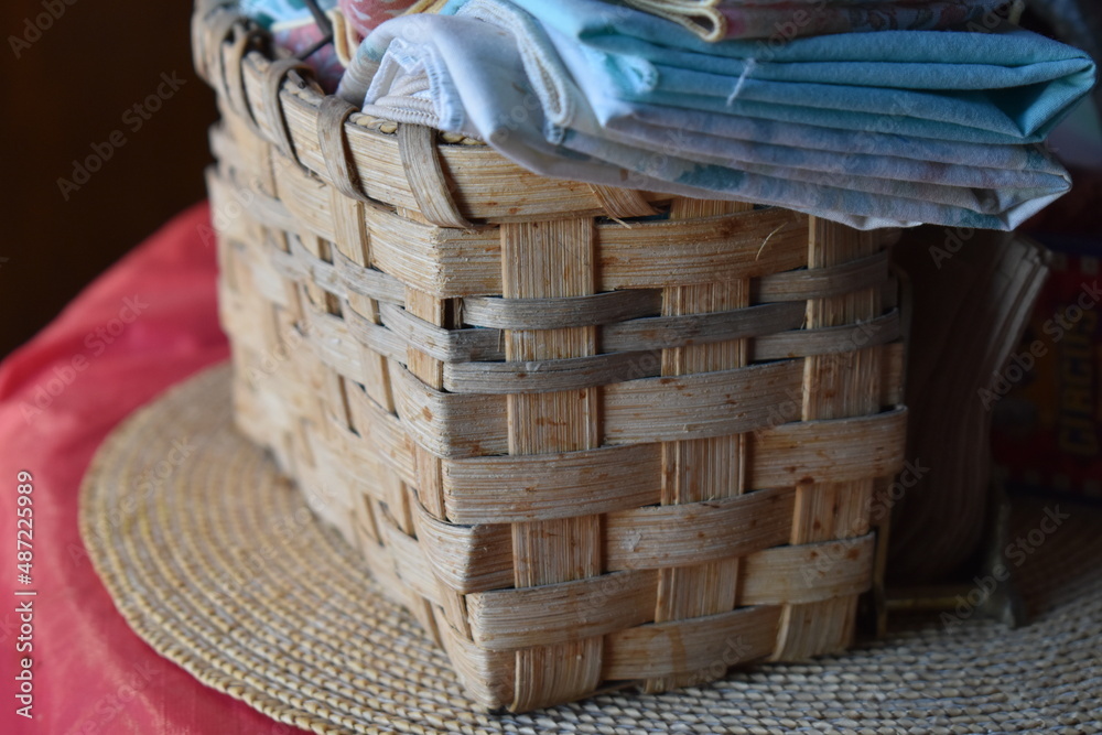 Obraz premium Woven Basket on a Table