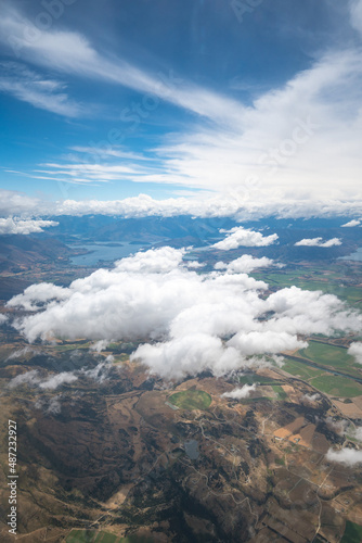 View of Queenstown New Zealand from Plane as It comes into Land on a Cloudy Day