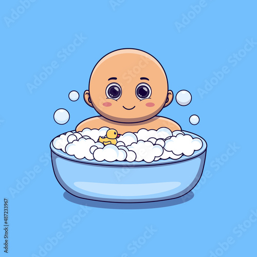 cute baby taking bath with duck toy and bubbles