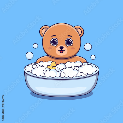 cute bear taking bath with duck toy and bubbles