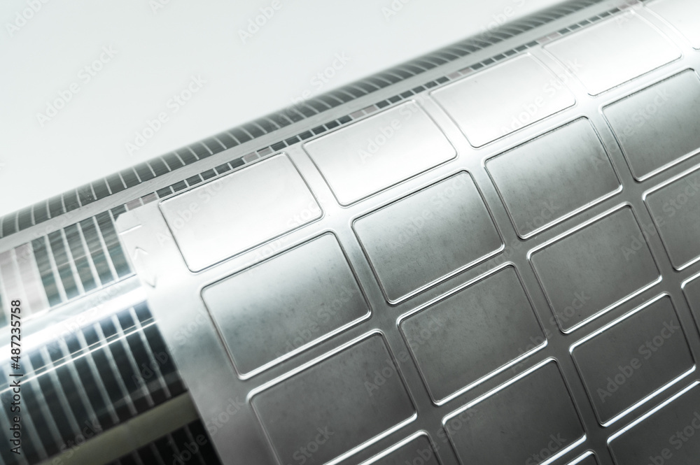 Used cylinder with attached flexible die for die cutting on