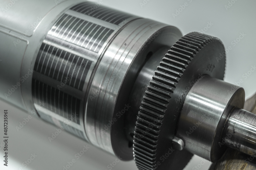 Used magnetic cylinder with attached flexible die for die cutting on rotary printing press. Die-cutting of labels. Cut knife for paper labels. Rotary stamp. Offset cutting knife for printing machine