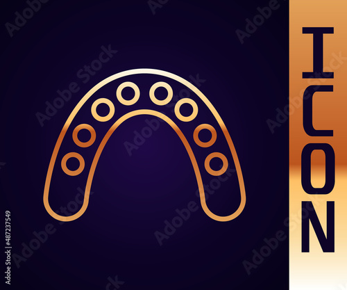 Gold line Mouth guard boxer icon isolated on black background. Vector