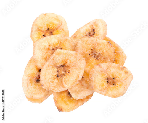 Banana chips isolated on white background. Dried fruit snack. Top view.