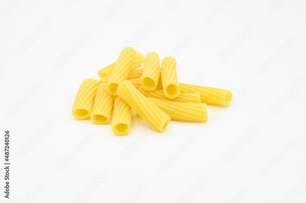 Raw Tortiglioni pasta, isolated on a white background Raw Tortiglioni pasta, isolated on a white background