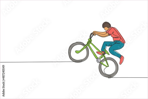 Single continuous line drawing of young BMX cycle rider show extreme risky trick in skatepark. BMX freestyle concept. Trendy one line draw design vector illustration for freestyle promotion media