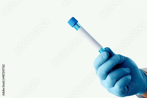 The nurce holding  tube of blood test with the blank label, Covid-19 Omicron Variant. photo