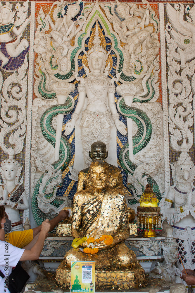 Buddha statue for thai people and foreign travelers travel visit and respect praying at Wat Pracha Rat Bamrung or Rang Man temple at Kamphaeng Saen city on January 27, 2022 in Nakhon Pathom, Thailand