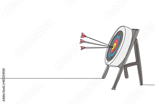 One continuous line drawing of arrows was shot bullseye to archery target, side view. Archery sport training and exercising concept. Dynamic single line draw graphic design vector illustration