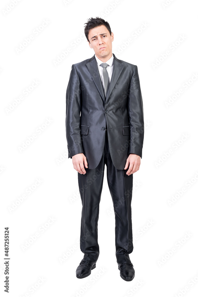 Tired young businessman standing isolated on white background Tired young businessman standing isolated on white background