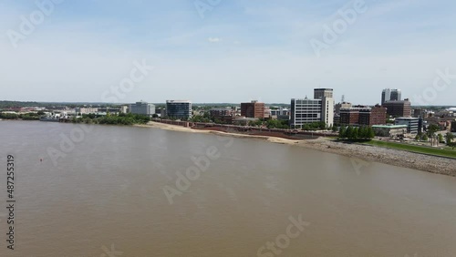 Drone flies over river in Evansville, Indiana on a beautiful day photo