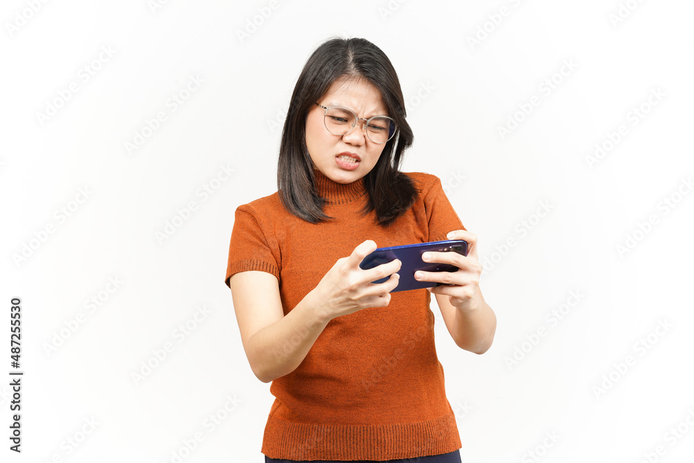 Playing game on Smartphone and lose the game Of Beautiful Asian Woman Isolated On White Background Playing game on Smartphone and lose the game Of Beautiful Asian Woman Isolated On White Background