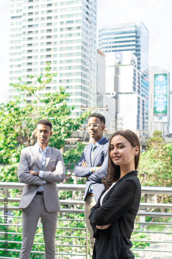 Group of business people.Business people meeting talking and sharing their ideas in city. Business team and teamwork concept. Business people standing outside in the city discussing about new project. Group of business people.Business people meeting talking and sharing their ideas in city. Business team and teamwork concept. Business people standing outside in the city discussing about new project.