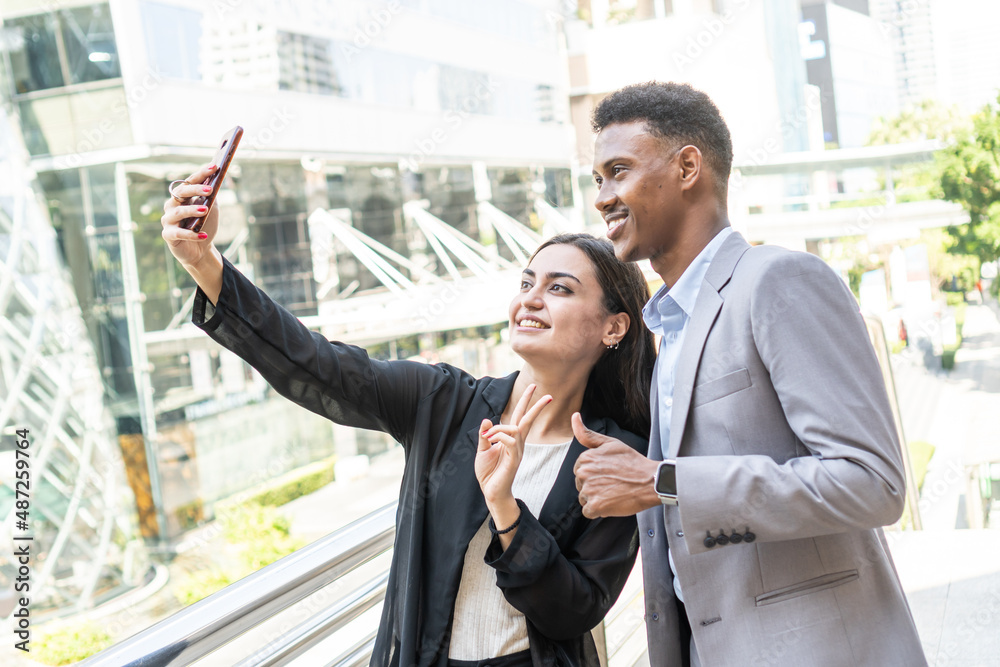 Group of business people.Business people meeting talking and sharing their ideas in city. Business team and teamwork concept. Business people standing outside in the city discussing about new project.